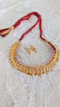 Round golden necklace earrings