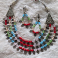 Colorful beaded necklace and earrings.